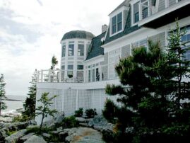 Oceanside view of majestic home.